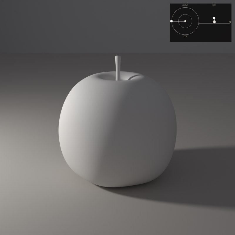 Side light makes half the apple dark. The texture and the roundness are at their strongest.