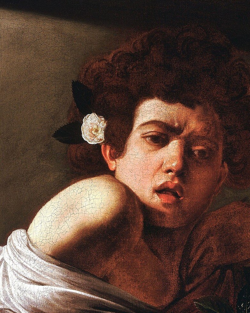 Caravaggio, Boy Bitten by a Lizard: a face lit from the upper left, the far side in shadow
